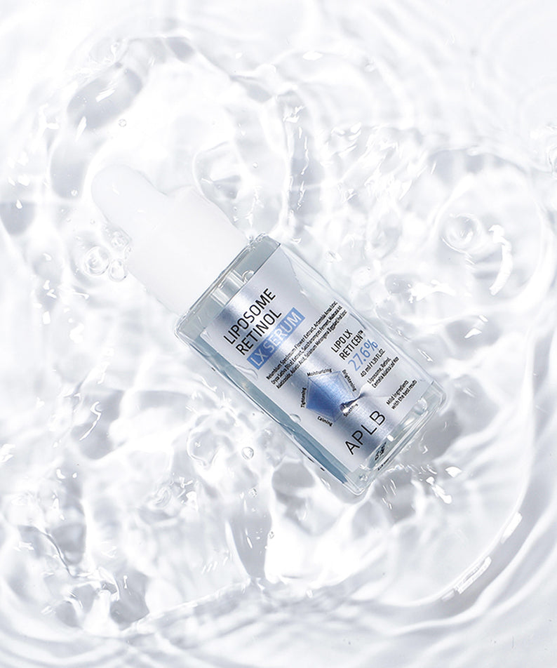 APLB Liposome Retinol LX Serum 40ml de APLB, flacon sur fond blanc, bulles/texture hydratante, style cosmétique.