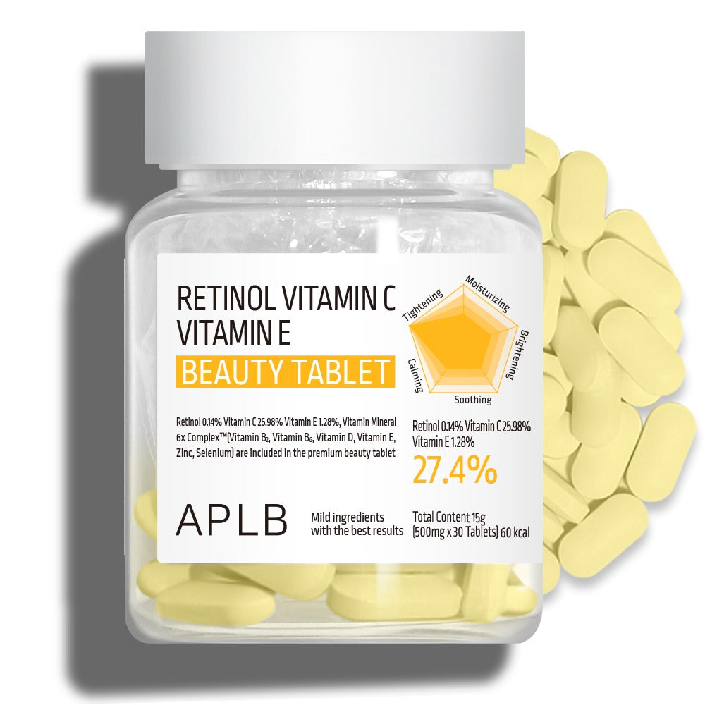 APLB Retinol Vitamin C Vitamin E Beauty Tablet APLB, flacon en verre sur fond clair, flocons jaunes en arrière-plan.
