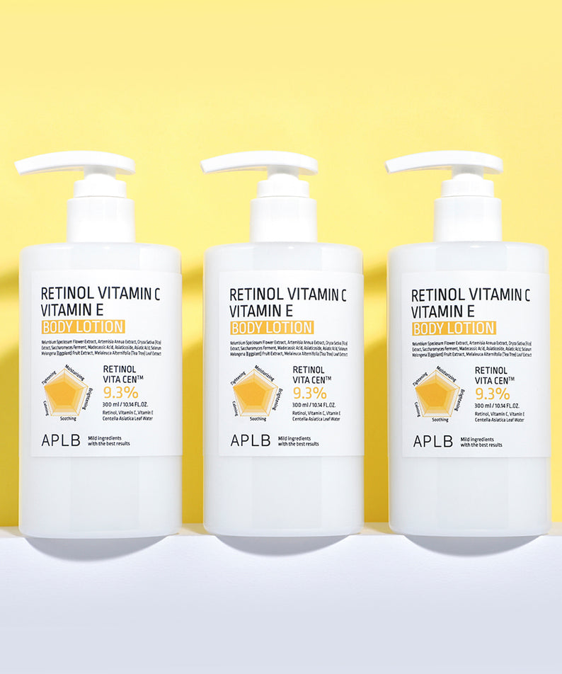 APLB Retinol Vitamin C Vitamin E Body Lotion 300ml, bouteilles sur fond jaune, marques APLB, contexte beauté soin corps