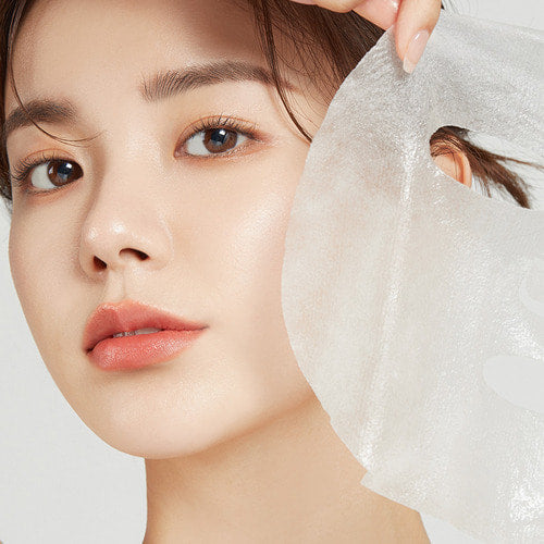 APRILSKIN Carrotent IPMP Calming & Hydrating Sheets Mask : femme visage avec masque en tissu hydratant, marque APRILSKIN