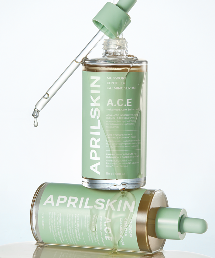 APRILSKIN Centella Calming Ampoule 110g, flacon vert avec goutte sur fond clair, marque APRILSKIN en contexte cosmétique