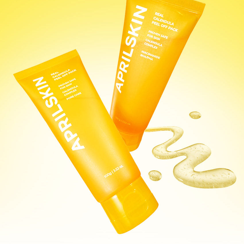 APRILSKIN Calendula Peel Off Pack 100g d’APRIL SKIN, photo produit sur fond jaune avec crème et gouttes