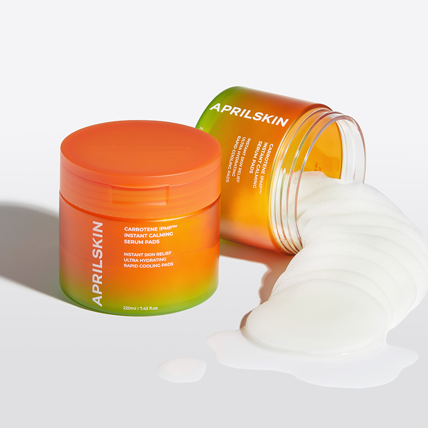APRILSKIN Carrotene IPMP Inatant Calming Serum Pad, marque APRILSKIN, sérum en pads apaisants sur fond blanc.