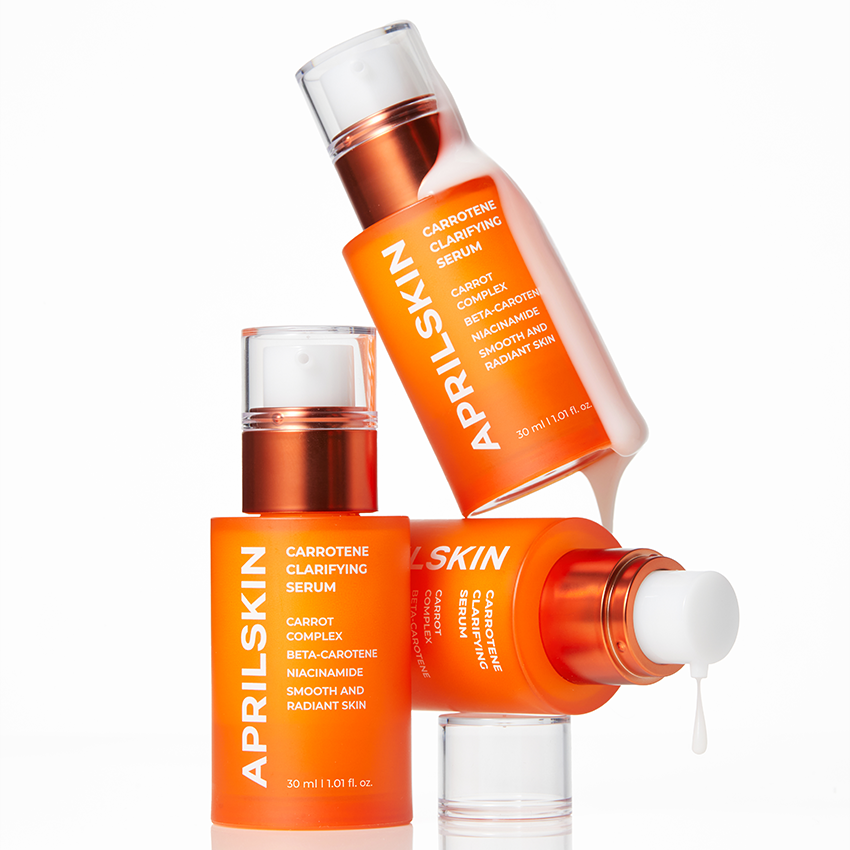 APRILSKIN Carrotene Clarifying Serum 30ml d’APRILSKIN, flacon orange sur fond blanc, goutte de sérum visible.