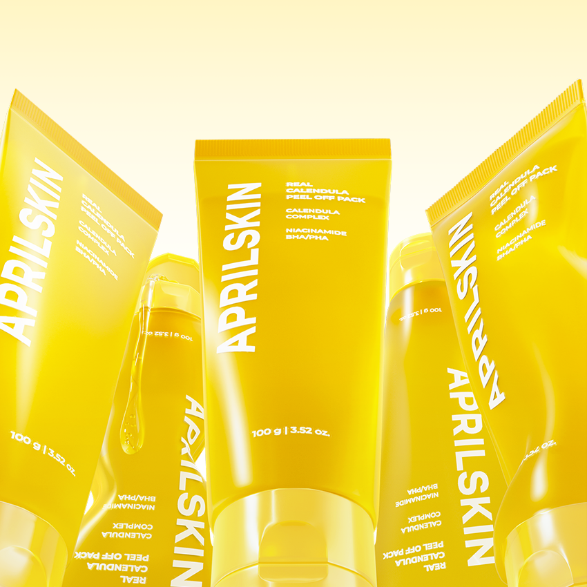 APRILSKIN Calendula Peel Off Pack 100g, pack crème jaune APRIL SKIN sur fond doré, produit en gros plan