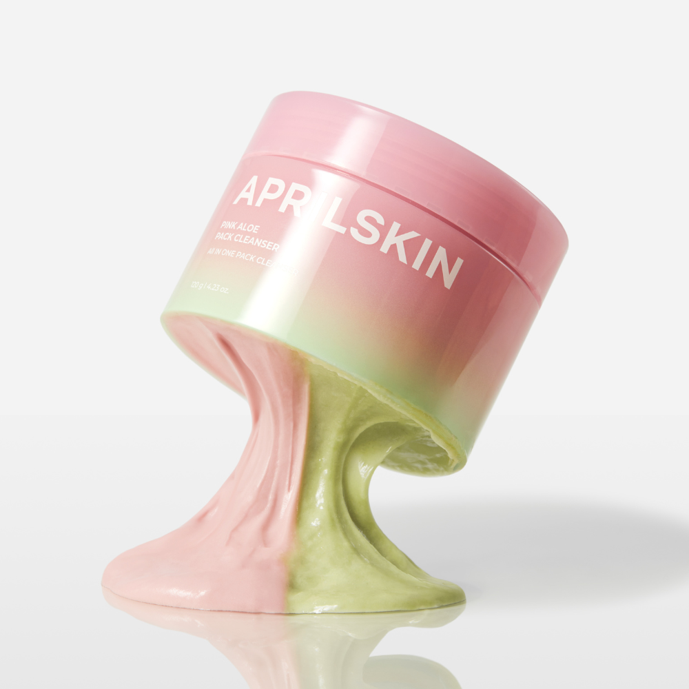 Décris l’image en français : APRILSKIN Pink Aloe Pack Cleanser, pot rose à effet dégradé, sur fond blanc.