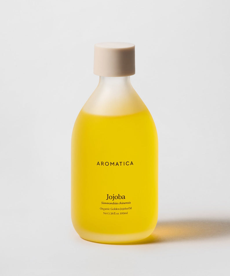 AROMATICA Organic Golden Jojoba Oil 100ml, flacon jaune sur fond clair, photo produit cosmétique, marqe AROMATICA