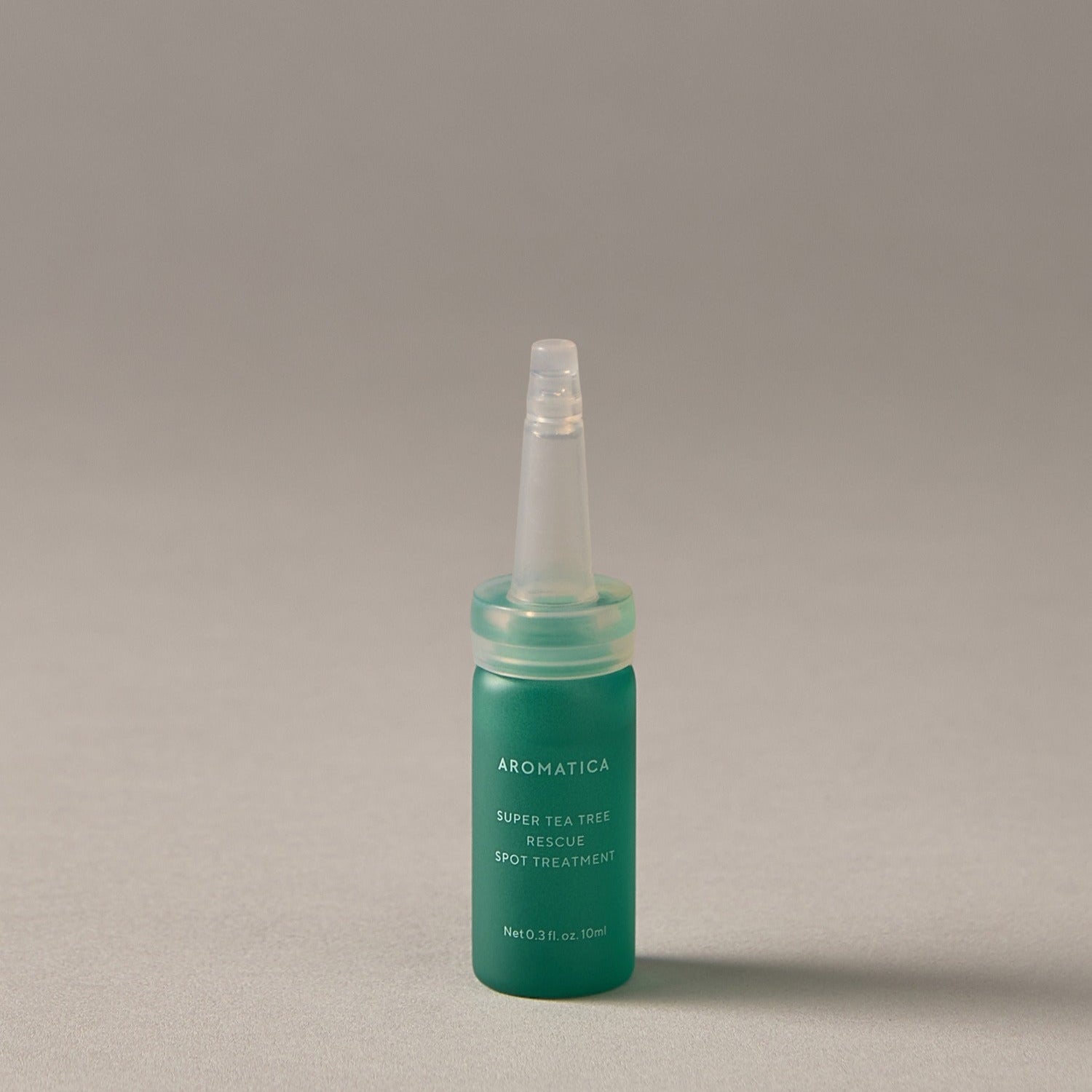 AROMATICA Super Tea Tree Rescue Spot Treatment 10ML de la marque AROMATICA, flacon sur fond clair, contexte skincare