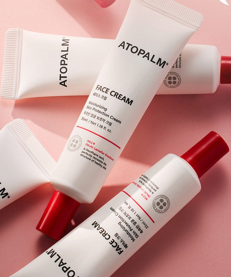 ATOPALM Face Cream 35ml, crème hydratante sur fond rose, tubes de 35ml pour soin de la peau, photo produit.