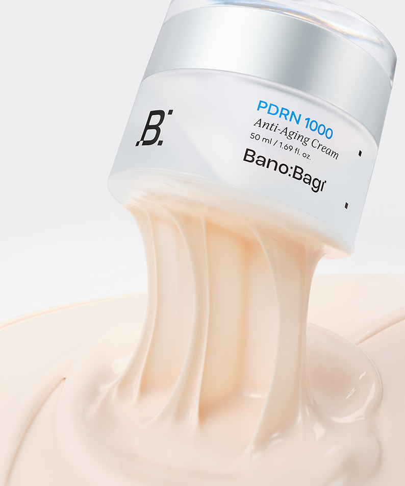 BANOBAGI PDRN 1000 Anti-Aging Cream 50ml, flacon et crème anti-âge, sur fond clair, visuel beauté en gros plan.