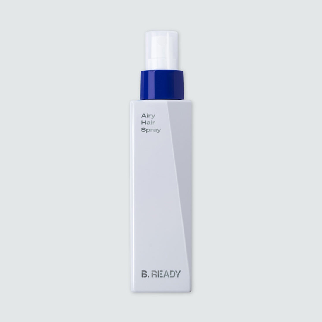 Flacon de BE.READY Airy Hair Spray 200ml en spray élégant pour cheveux volumineux, design moderne, packaging blanc et bleu.