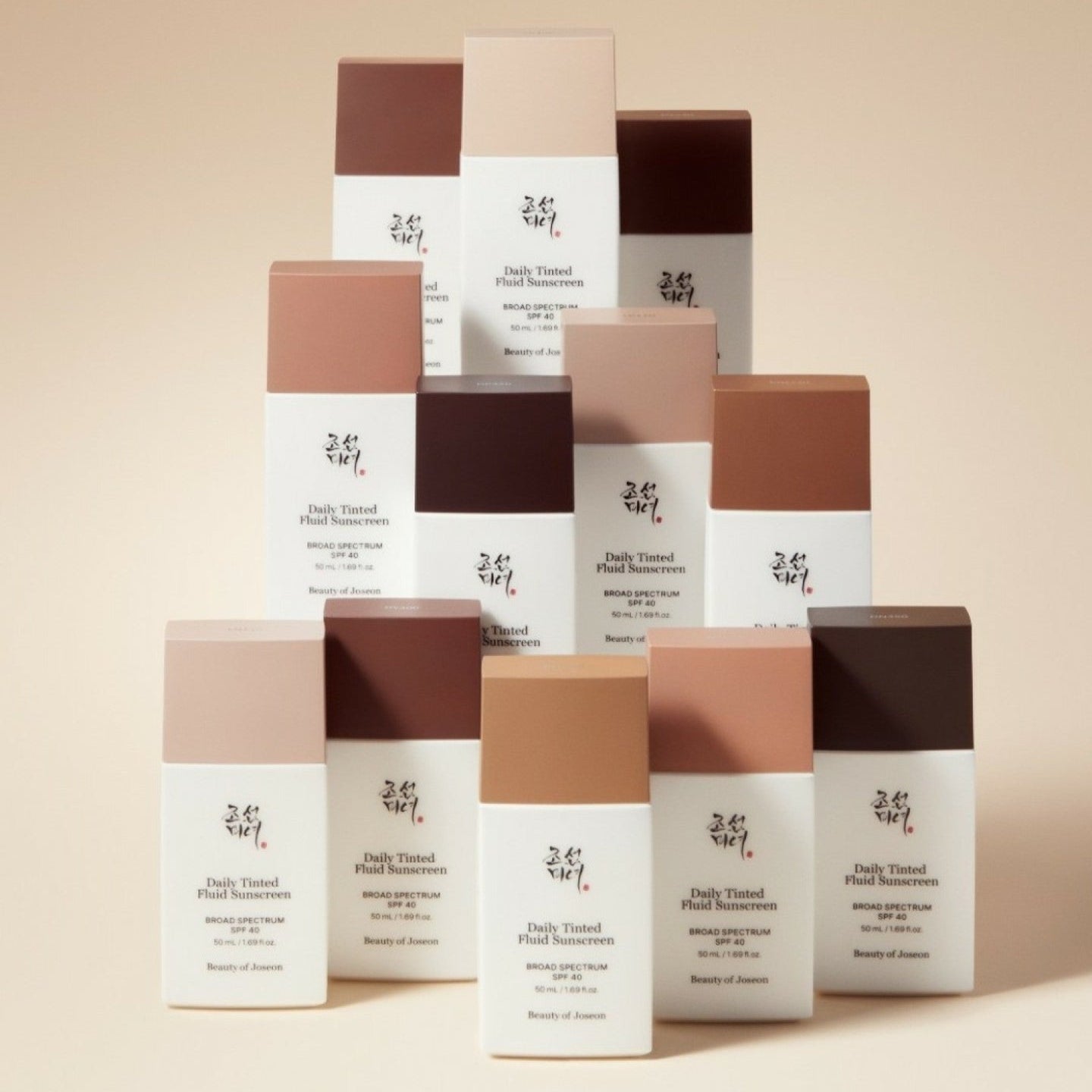 BEAUTY OF JOSEON Daily Tinted Fluid Sunscreen 50ml : flacons alignés sur fond clair, marque coréenne, packaging maquillage solaire.