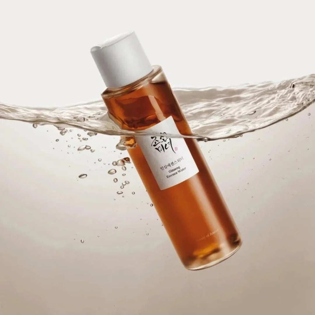 BEAUTY OF JOSEON Ginseng Essence Water 150ml : flacon ambré et éclaboussures d’eau sur fond blanc, marque en évidence.