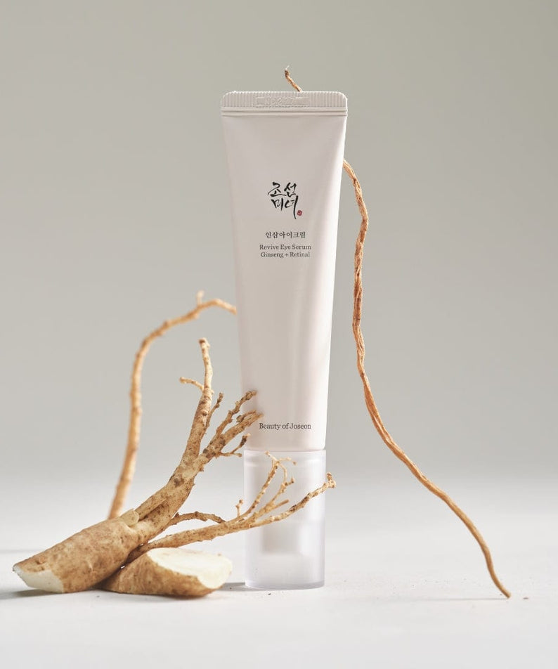 BEAUTY OF JOSEON Revive Eye Serum 30ml : tube blanc sur fond clair avec racines/branches décoratives, branding marque
