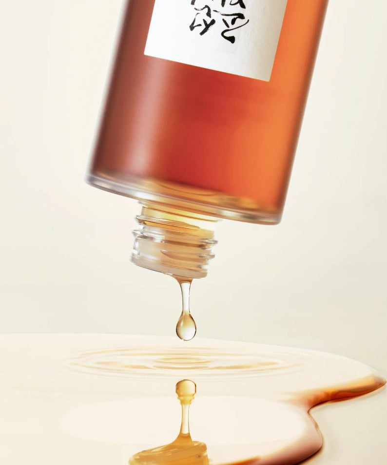 BEAUTY OF JOSEON Ginseng Essence Water 150ml, flacon brillance dorée, goutte d’essence sur fond clair, photo produit