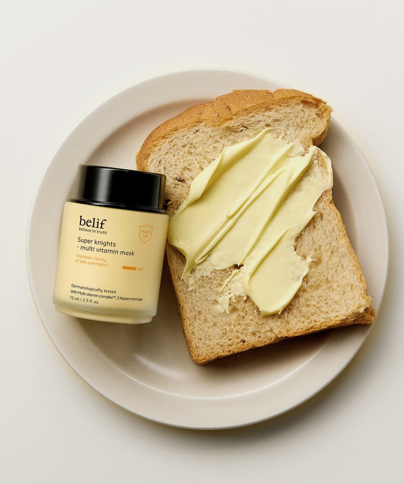 BELIF Super Knights Multi Vitamin Mask 75ml, produit Belif sur toast et crème jaune, photo lifestyle sur fond clair