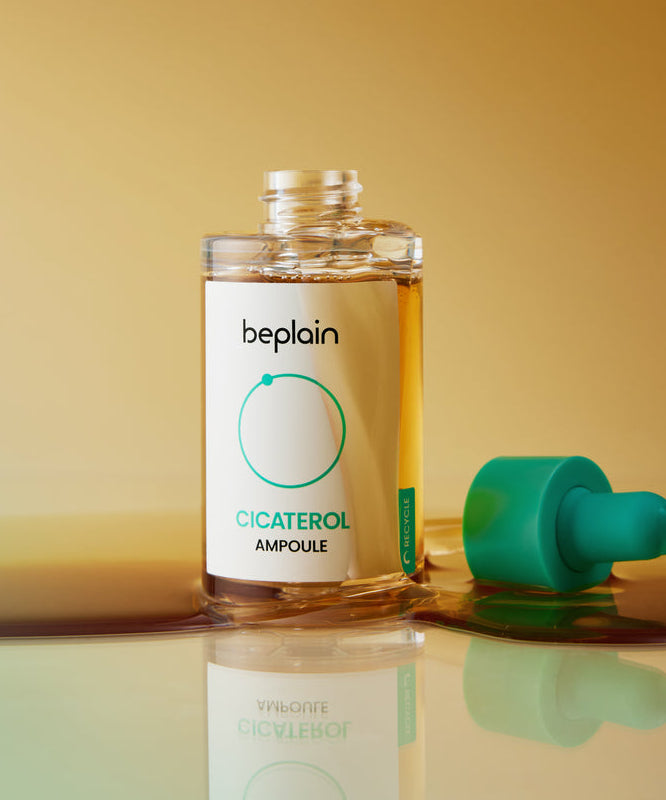 BEPLAIN Cicaterol Ampoule 30ml de Beplain en flacon, fond jaune; amboules et reflet sur table.