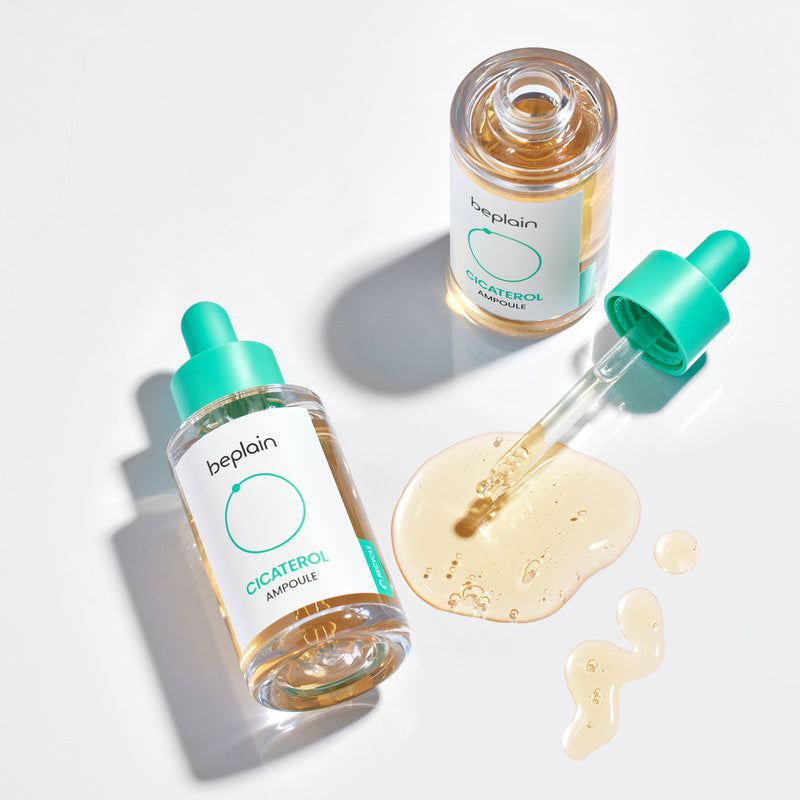 BEPLAIN Cicaterol Ampoule 30ml de la marque Beplain : flacons verts et sérum liquide sur fond blanc, contexte beauté