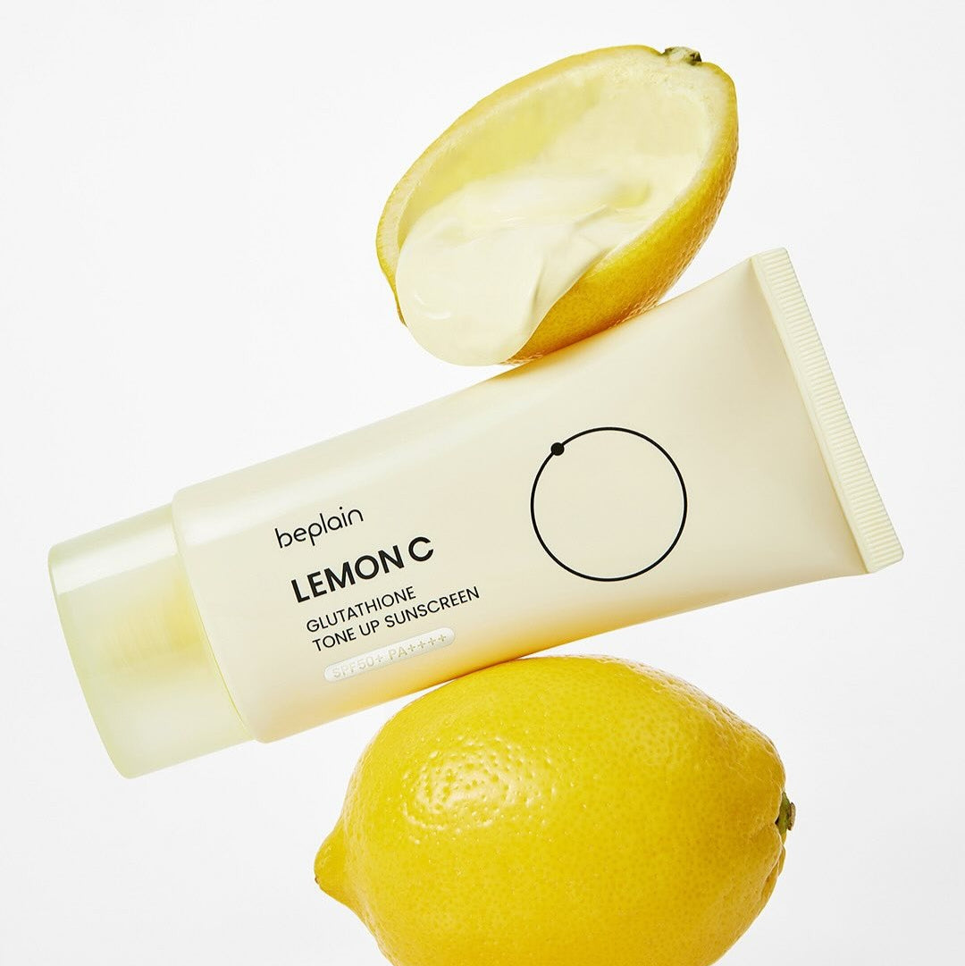 BEPLAIN Lemon Seed Glutathione Tone-up Sun Cream 50ml, tube beplain sur fond blanc, avec citron coupé, pack en gros plan