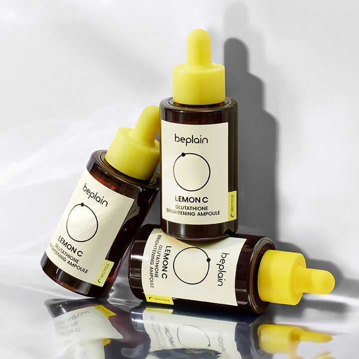 BEPLAIN Lemon Seed Glutathione Whitenning Ampoule 30ml de beplain, ampoules jaunes sur fond blanc, goutteurs visibles.