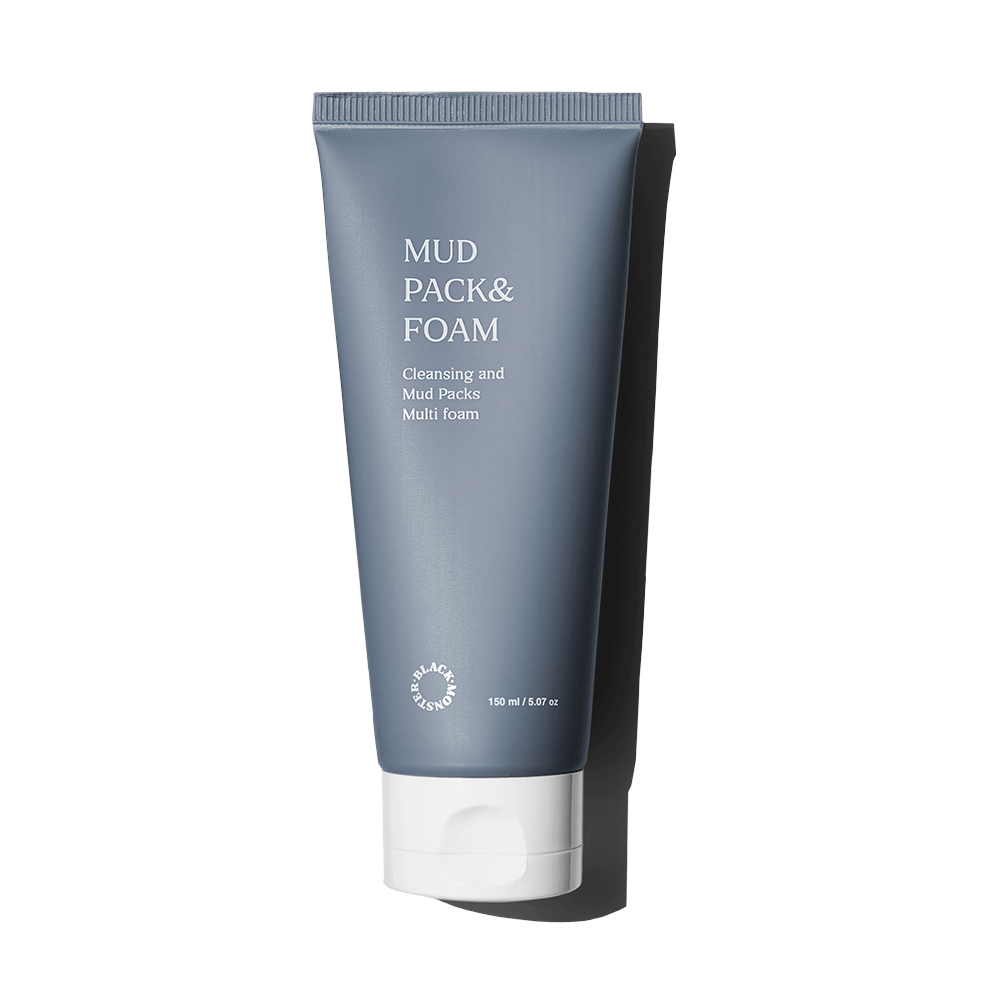 Décris l'image en français : BLACK MONSTER Mud Pack & Foam 150ml, tube bleu « Mud Pack & Foam », fond clair