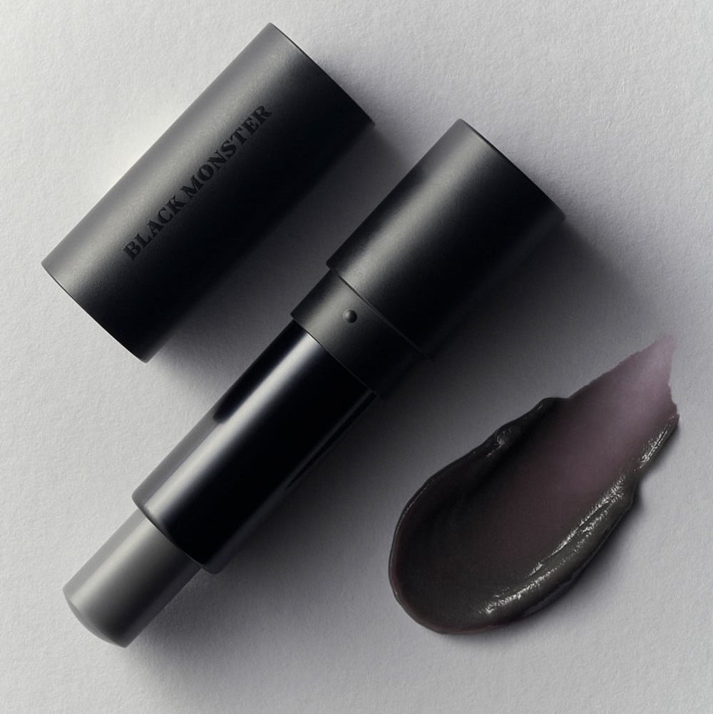 BLACK MONSTER Not Black Bomb, produit noir sur fond clair; bouchon et tube en vue, marque en contexte visuel.