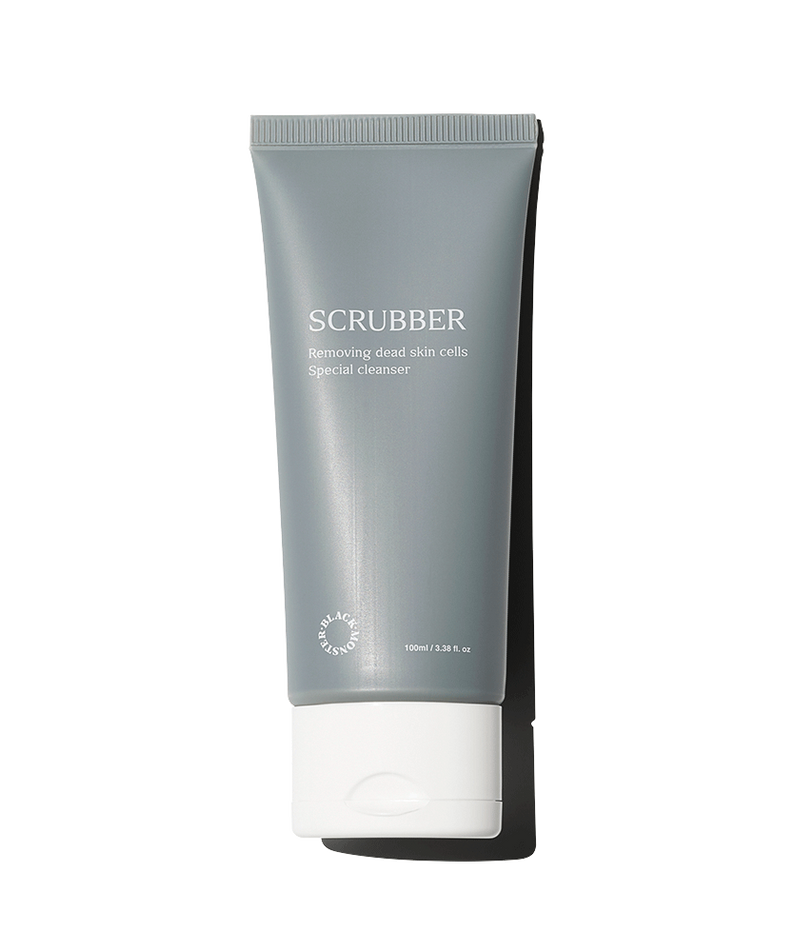 BLACK MONSTER Scrubber 100ml, tube de nettoyant exfoliant sur fond clair, marque visible SCRUBBER.