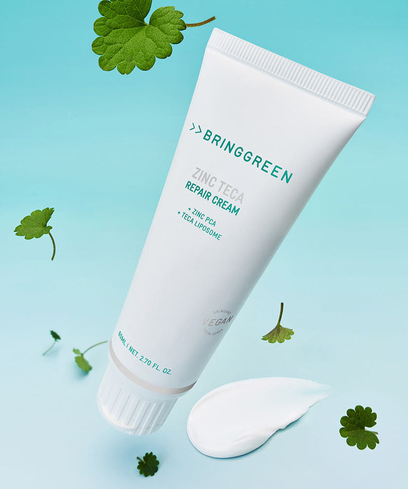 BRINGGREEN Zinc Teca Repair Blemish Cream 80ml de la marque BRINGGREEN, tube blanc sur fond bleu avec herbes.