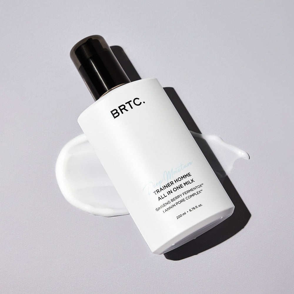 BRTC Trainer Homme ALl-in-One Milk 200ml, flacon crème blanche BRTC sur fond clair, contexte beauté homme.