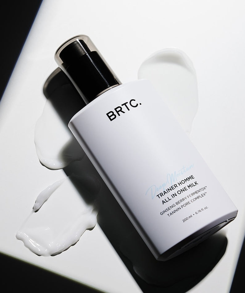 Décris l'image en français en mentionnant le produit, la marque et le contexte visuel : BRTC Trainer Homme ALl-in-One Milk 200ml.