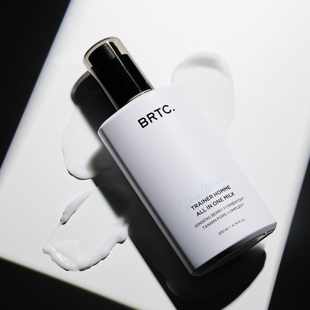 Décris l'image en français en mentionnant le produit, la marque et le contexte visuel : BRTC Trainer Homme ALl-in-One Milk 200ml.