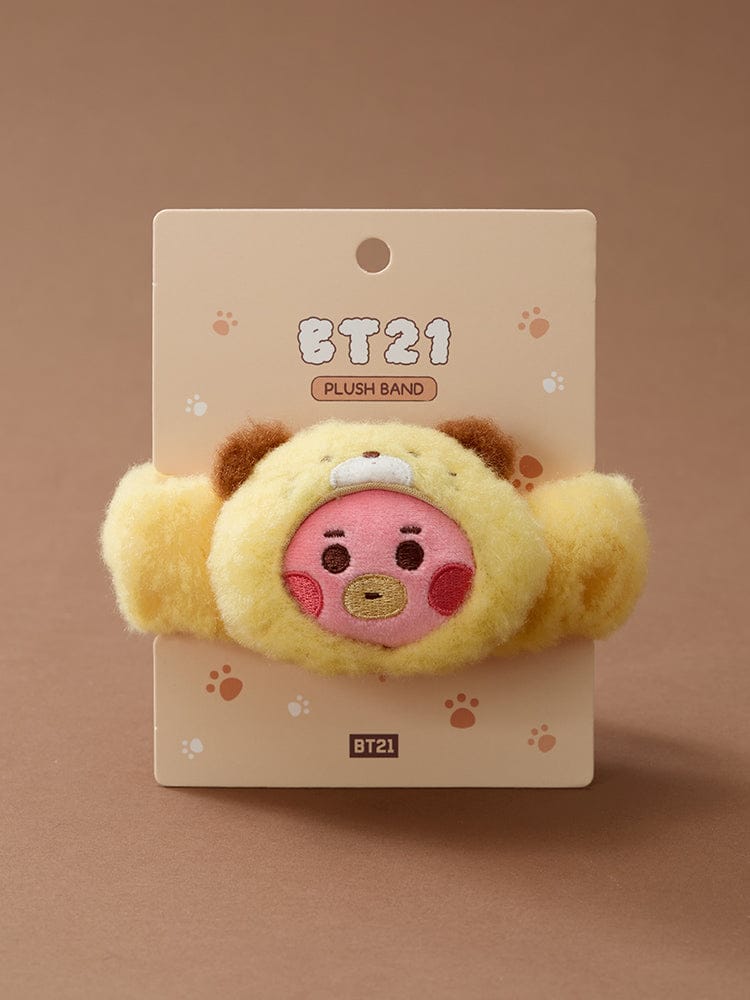 BT21 BABY MORE FLUFFY FACE PLUSH BAND peluche sur carte LINE FRIENDS, fond beige, visuel mignon en gros plan.