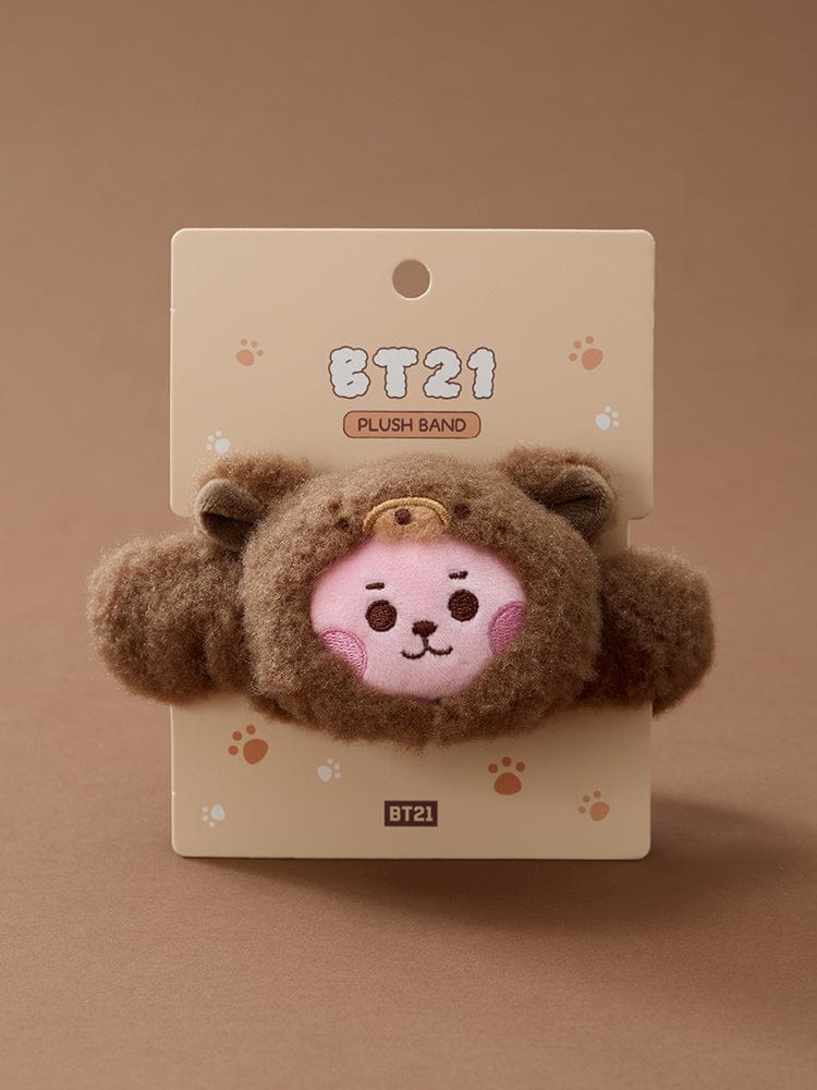 BT21 BABY MORE FLUFFY FACE PLUSH BAND, peluche visage ultra douce sur carte, personnage brun aux pattes, fond beige