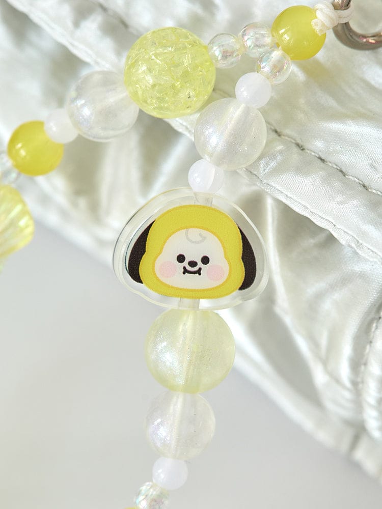 BT21 CHIMMY BABY PEARL BEADED KEYRING, porte-clés officiel LINE FRIENDS avec perles blanches et jaune, sur tissu crème