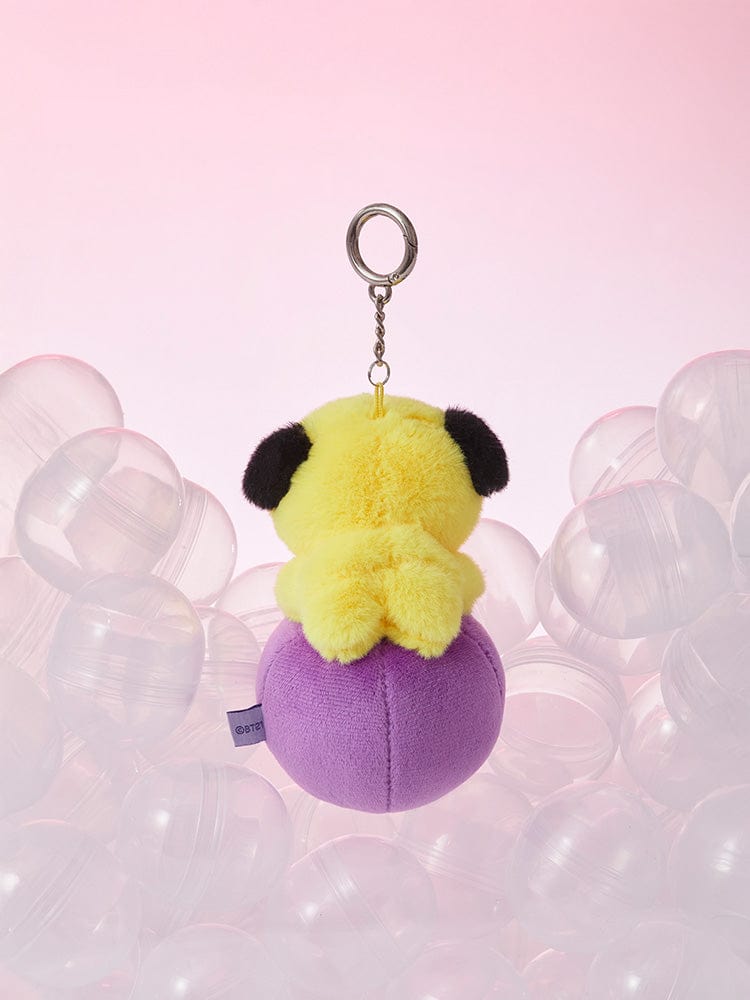 BT21 CHIMMY minini PLUSH KEYRING LUCKY GATCHA, porte-clés plush CHIMMY sur fond rose, entouré de bulles transparentes