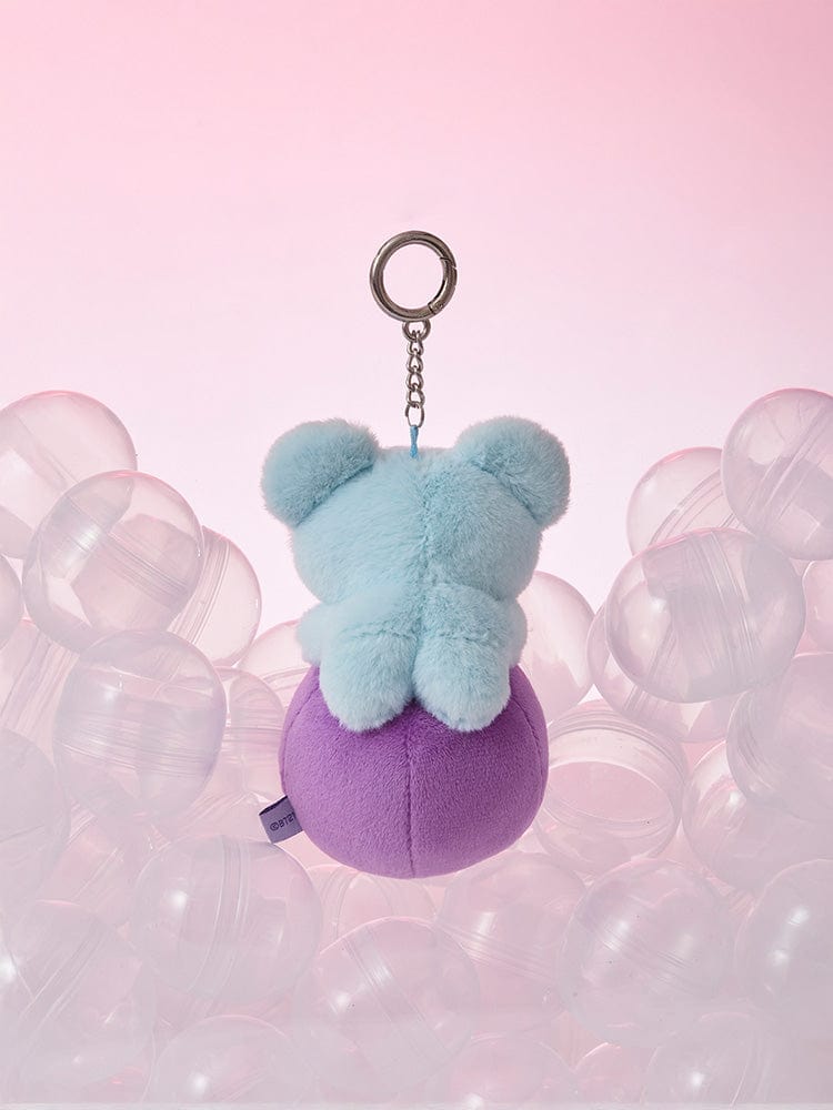 BT21 KOYA minini PLUSH KEYRING LUCKY GATCHA, porte-clés KOYA koala bleu, sur fond rose avec bulles visuelles.