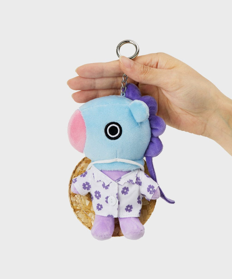 BT21 MANG SUMMER LANE BODY BAG CHARM, porte-clés LINE FRIENDS en main, MANG poney danseur masqué sur fond clair.