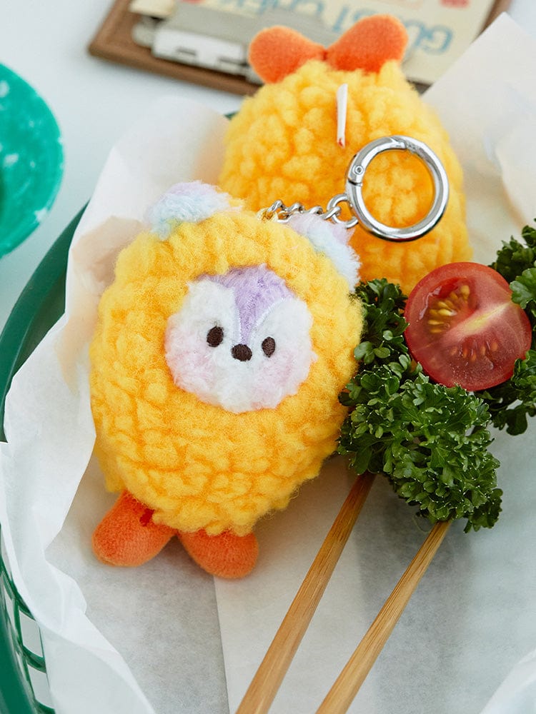 BT21 MANG minini PLUSH KEYRING BUNSIK : porte-clés peluche MANG sur papier cadeau avec herbes et photo produit BT21.