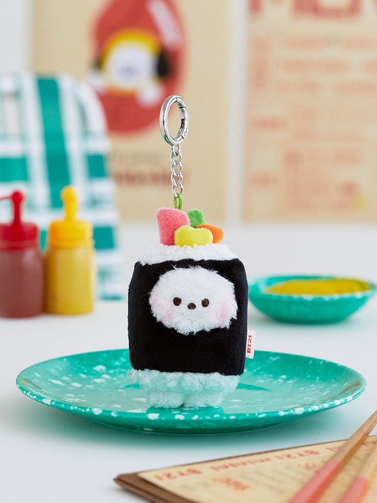 BT21 RJ minini PLUSH KEYRING BUNSIK porte-clés en peluche RJ sur assiette, décor K-pop LINE FRIENDS, fond jouets.