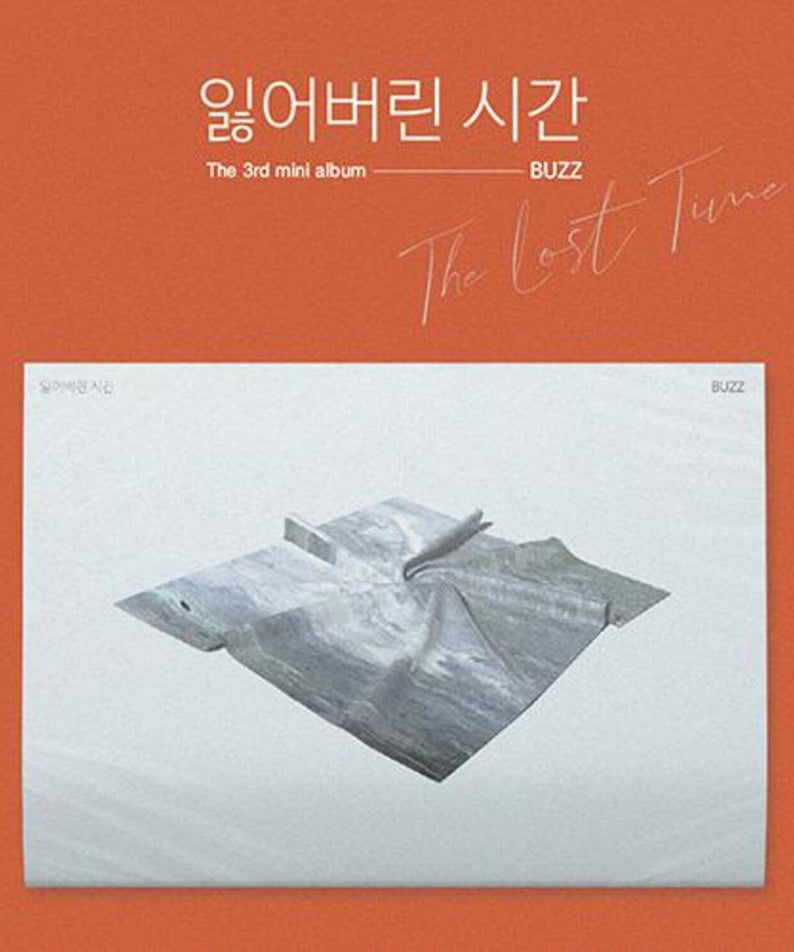 BUZZ - Album Kpop de BUZZ, pochette sur fond orange avec le titre The last time et l’image des morceaux de papier