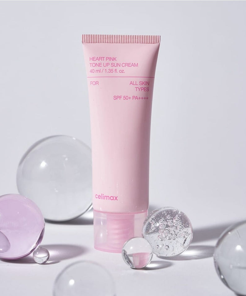 CELIMAX Heart Pink Tone-up Sun Cream 40ml de la marque Celimax, tube rose sur fond clair avec bulles décoratives.