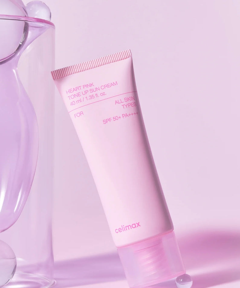 CELIMAX Heart Pink Tone-up Sun Cream 40ml de la marque Celimax, crème solaire rosée sur fond rose en studio