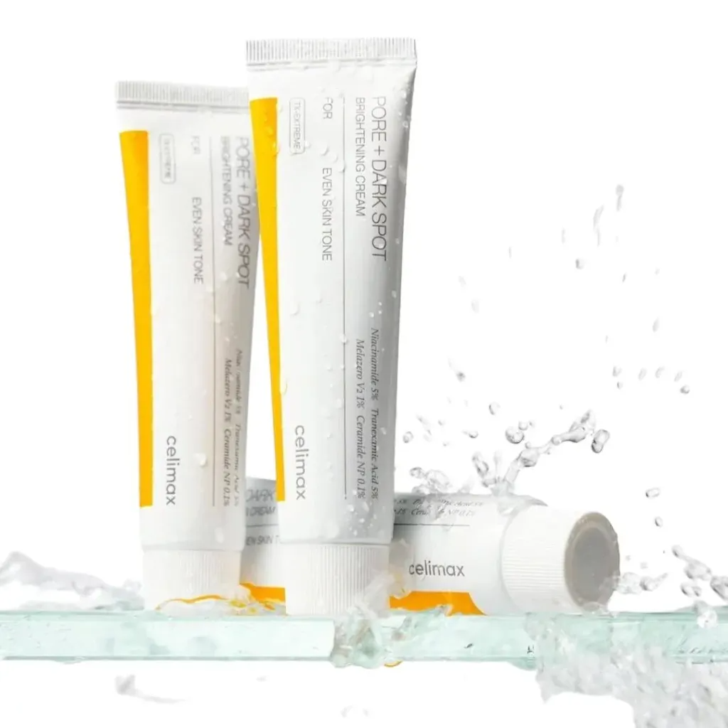 CELIMAX Pore Dark Spot Brightening Cream 35ml, tubes de la marque sur fond blanc avec gouttes et éclaboussures