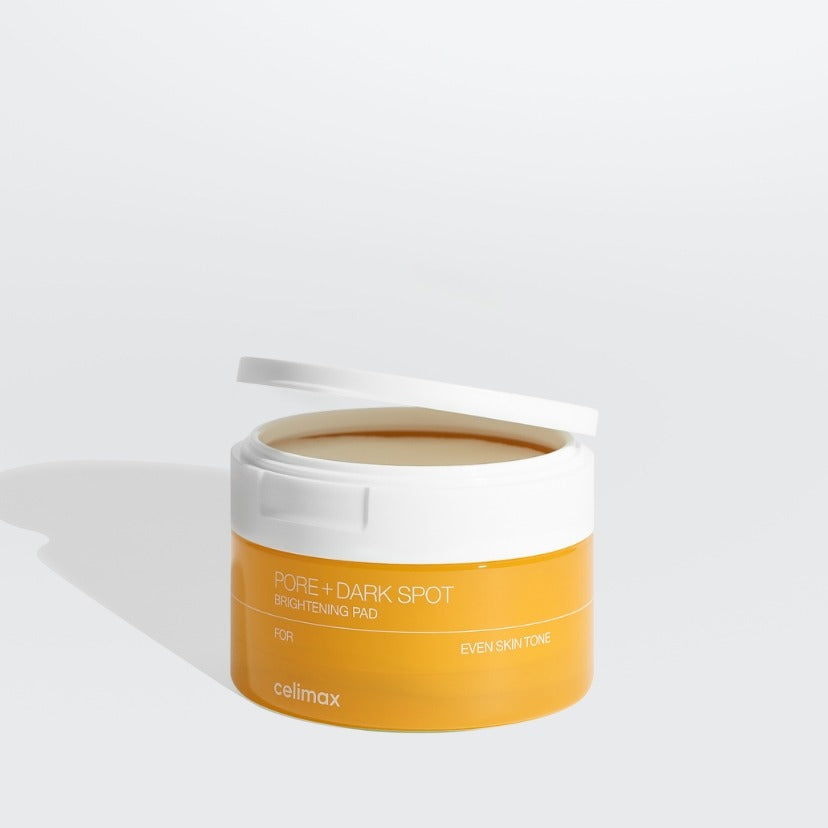 CELIMAX Pore Dark Spot Brightening Pad 40ea, pot blanc et orange sur fond clair, produit Celimax pour taches sombres