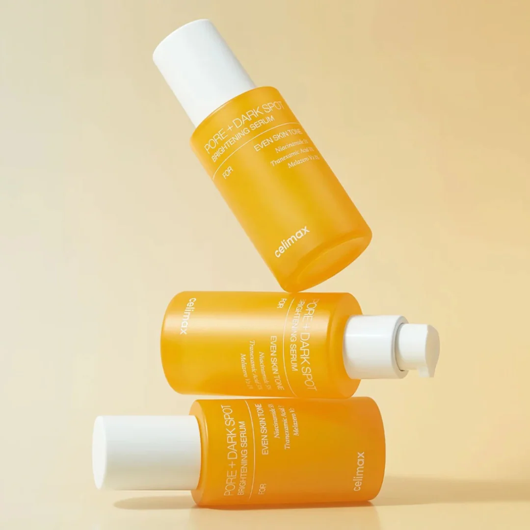 CELIMAX Pore Dark Spot brightening Serum 30ml : flacons orange sur fond beige, marque CELIMAX, éclaircissant taches pores