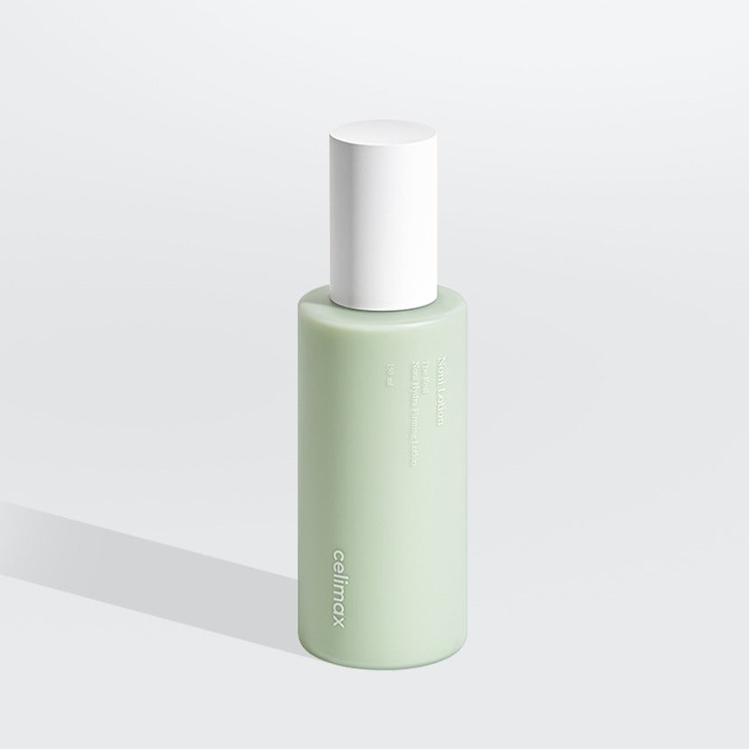 CELIMAX The Real Nino Hydra Firming Lotion 150ml, flacon vert avec pompe, fond blanc, produit de soin en vitrine.