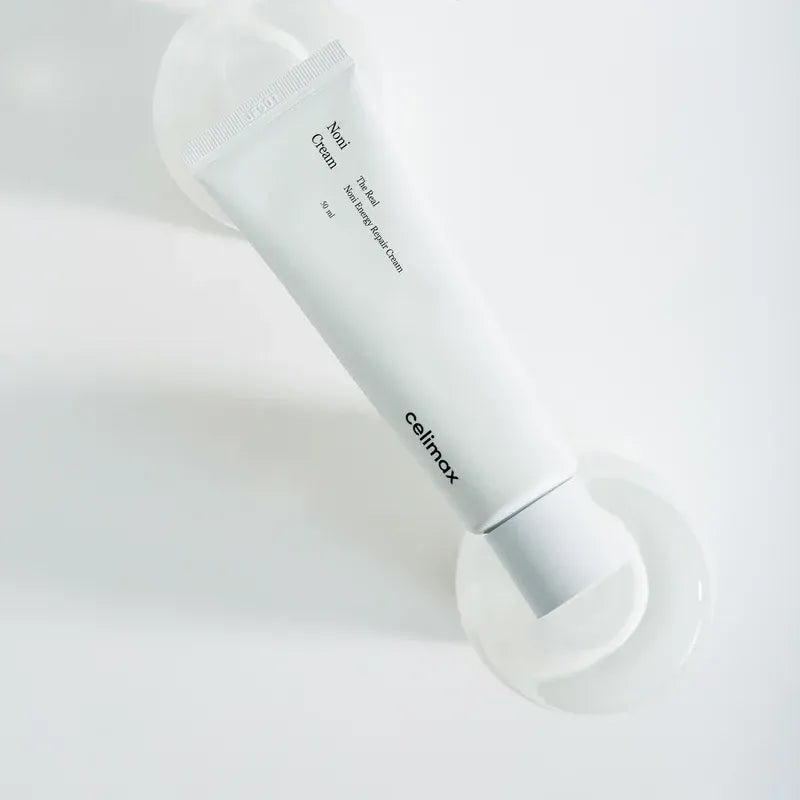 CELIMAX The Real Noni Energy Repair Cream 50ml, tube blanc sur fond clair, marque Celimax, contexte visuel produit en gros plan.