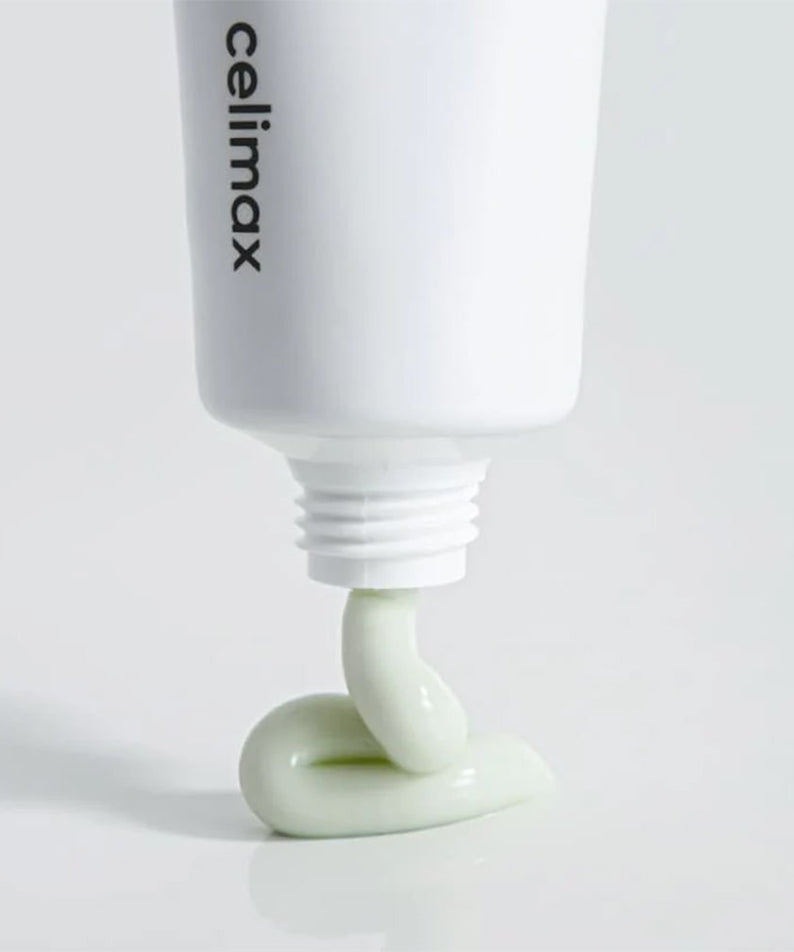 CELIMAX The Real Noni Energy Repair Cream 50ml : tube blanc et crème verte, goutte sur fond clair, produit de la marque