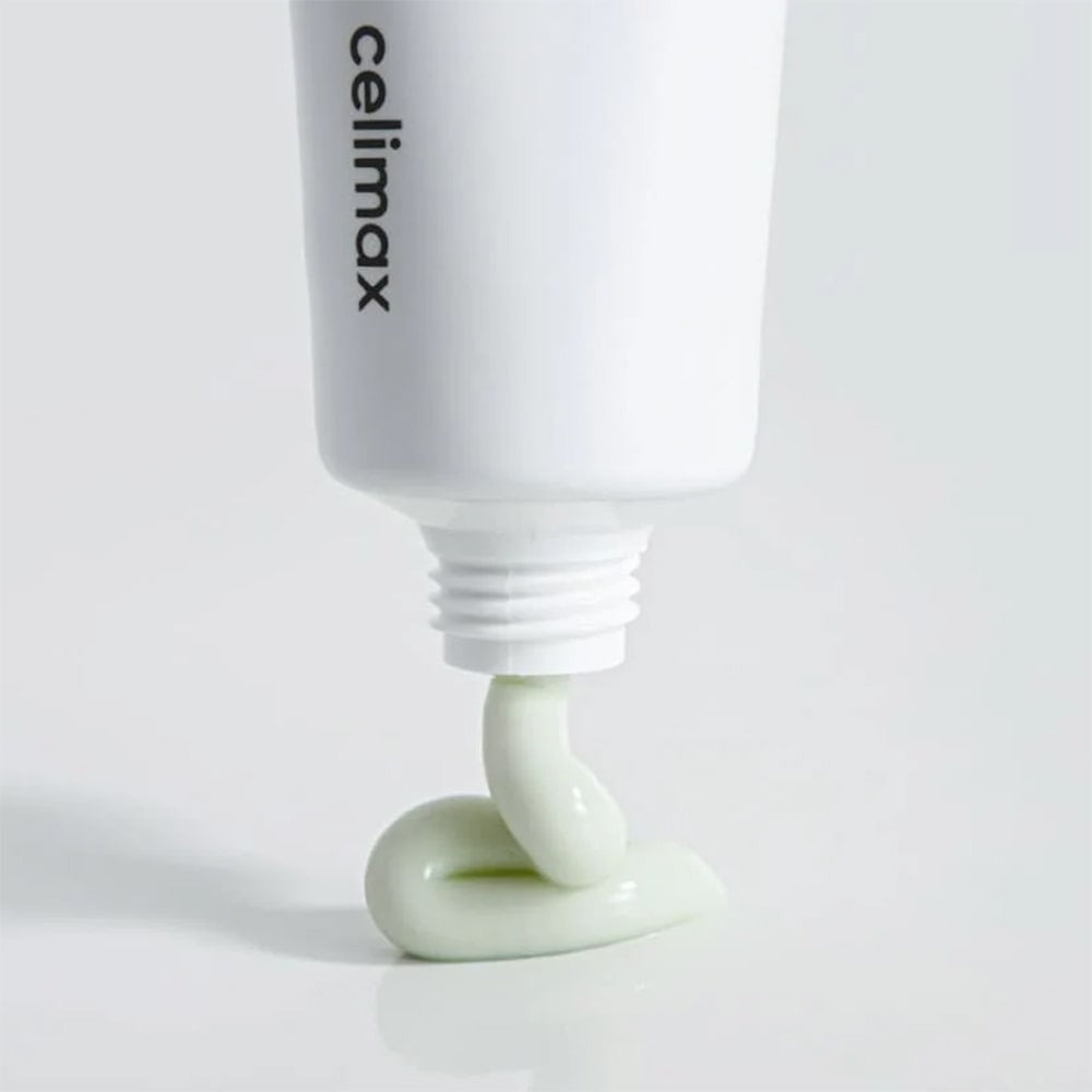 CELIMAX The Real Noni Energy Repair Cream 50ml : tube blanc et crème verte, goutte sur fond clair, produit de la marque
