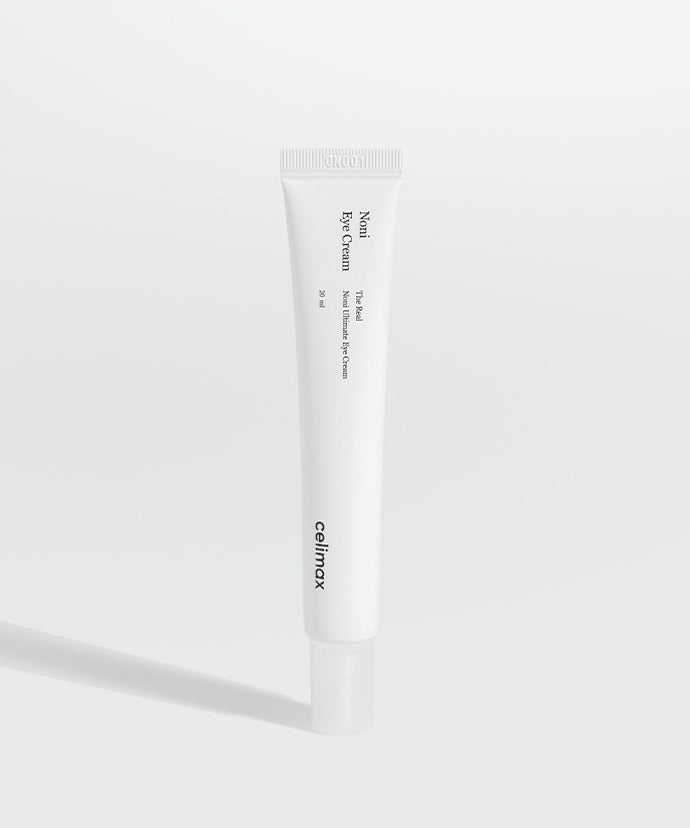 CELIMAX The Real Noni Ultimate Eye Cream 20ml : tube crème contour des yeux sur fond blanc, marque CELIMAX, éclairage studio.